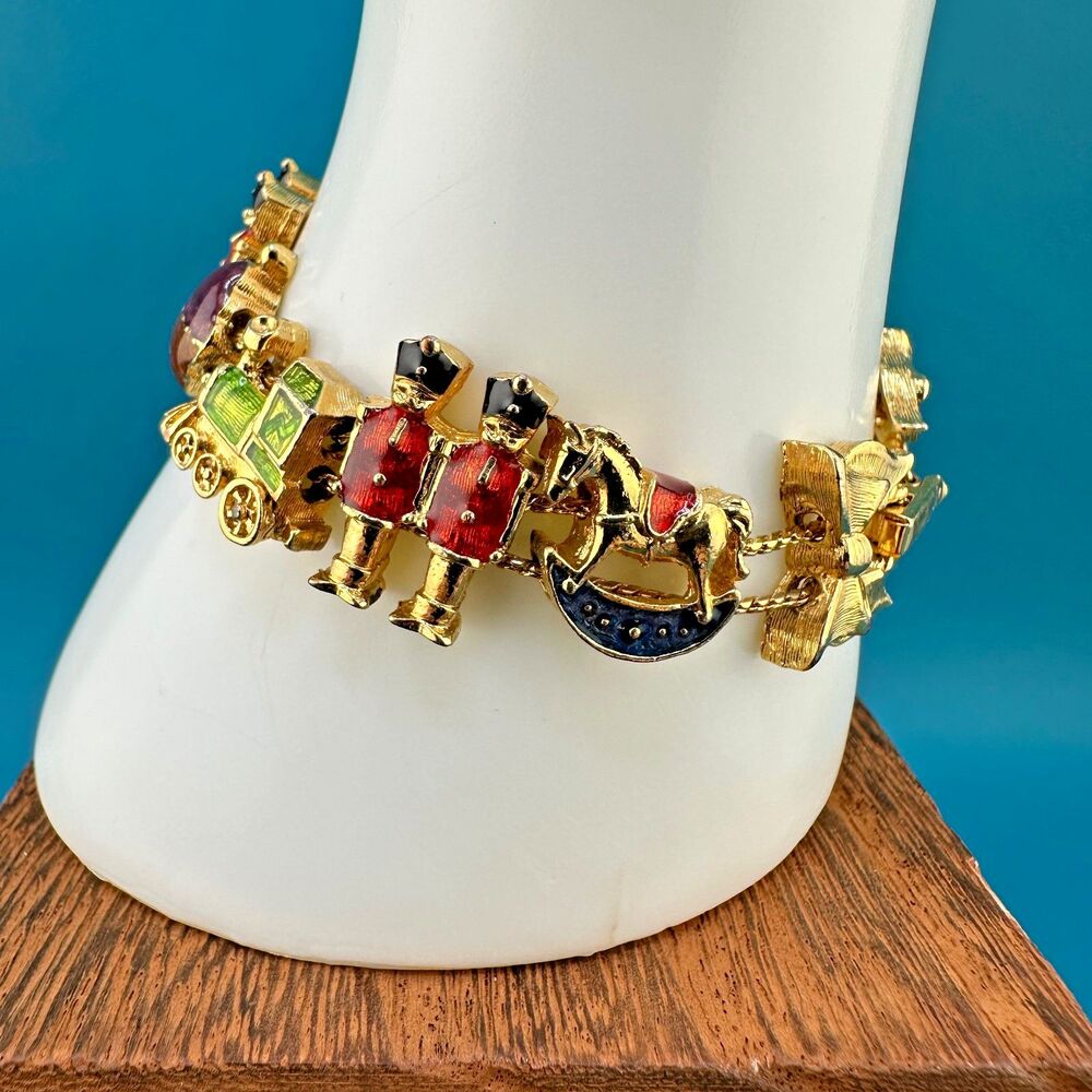 Vintage Slide Charm Bracelet Toy Soldier Rocking Horse Train Gold Tone Signed